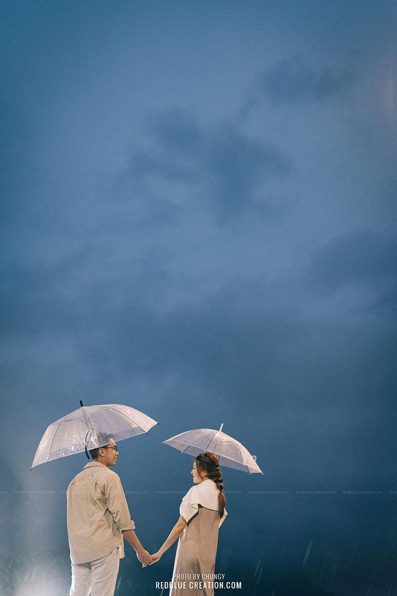 Ballerina with umbrella on city street on background sky and bui Stock  Photo by ©stasia04 135070262